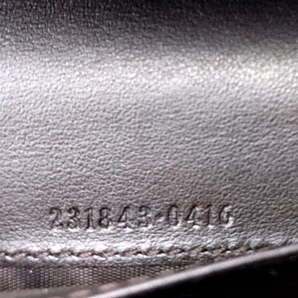 Authentic, New, and Unused Women’s Gucci Calfskin Studded Soho Continental Wallet Black 231843 interior serial number close-up