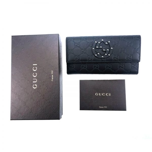 Authentic, New, and Unused Women’s Gucci Calfskin Studded Soho Continental Wallet Black 231843 top view with gucci box