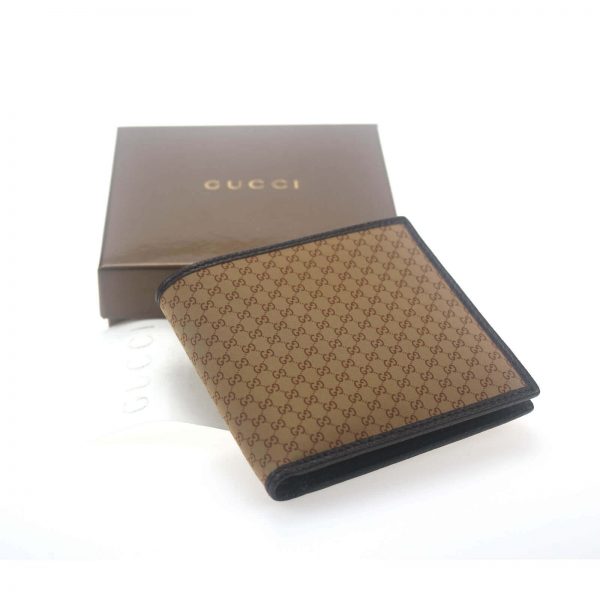 Authentic, New, and Unused Men’s Gucci Brown Signature GG monogram wallet 150404 interior serial number close-up top view