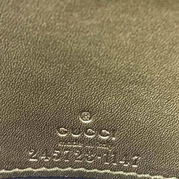 Authentic, New, and Unused Gucci GG Shine Heart Plaque Continental Clutch Wallet Olive Green 245728 interior serial number