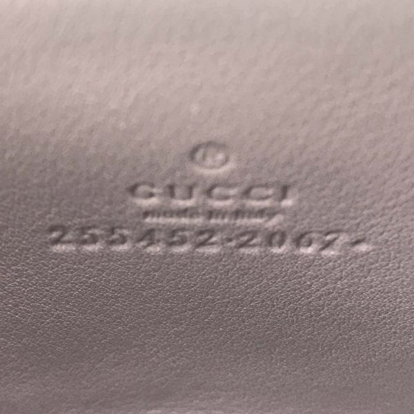 Authentic, New, and Unused Gucci Leather GG Guccissima Zip Around Card Coin Case Wallet Mauve 255452 interior serial number
