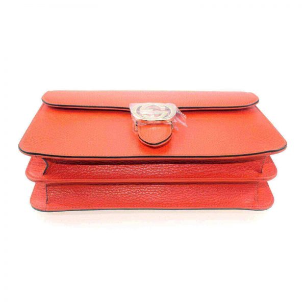 Authentic, New, and Unused Gucci Leather Interlocking GG Marmont Crossbody Purse Handbag Orange 510303 bottom side view