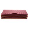 Authentic, New, and Unused Gucci Red Leather Microguccissima Double Zip Travel Wallet 544250 bottom side view
