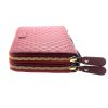 Authentic, New, and Unused Gucci Red Leather Microguccissima Double Zip Travel Wallet 544250 left side view